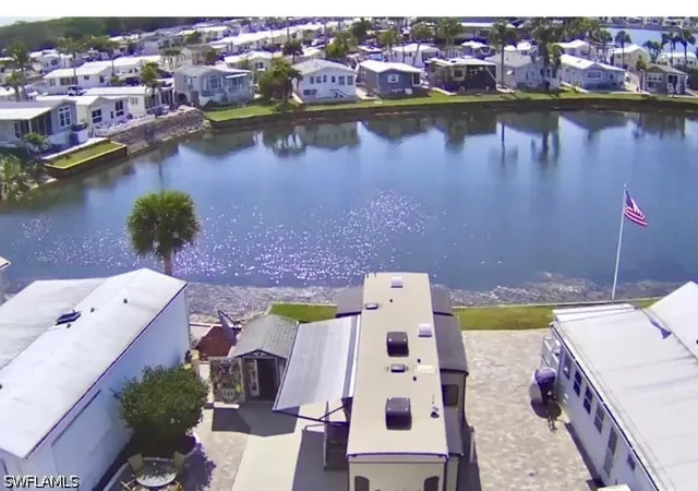 Photo 3 of Manufactured home for sale at 564 Cattleya Refuge #564, Naples, FL 34114 | MLS# 226030822 | Listing updated on 2026-10-07