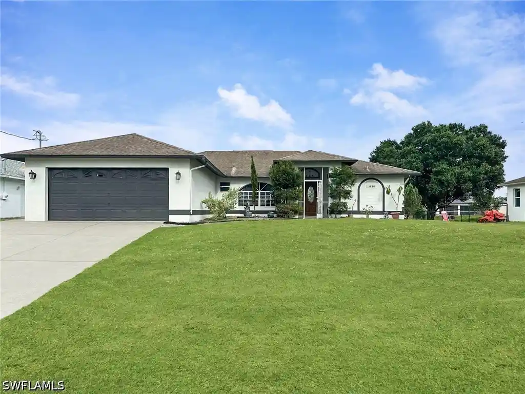 Single family home for sale at 920 Alaska Ave, Lehigh Acres, FL 33971 | MLS# 226036426