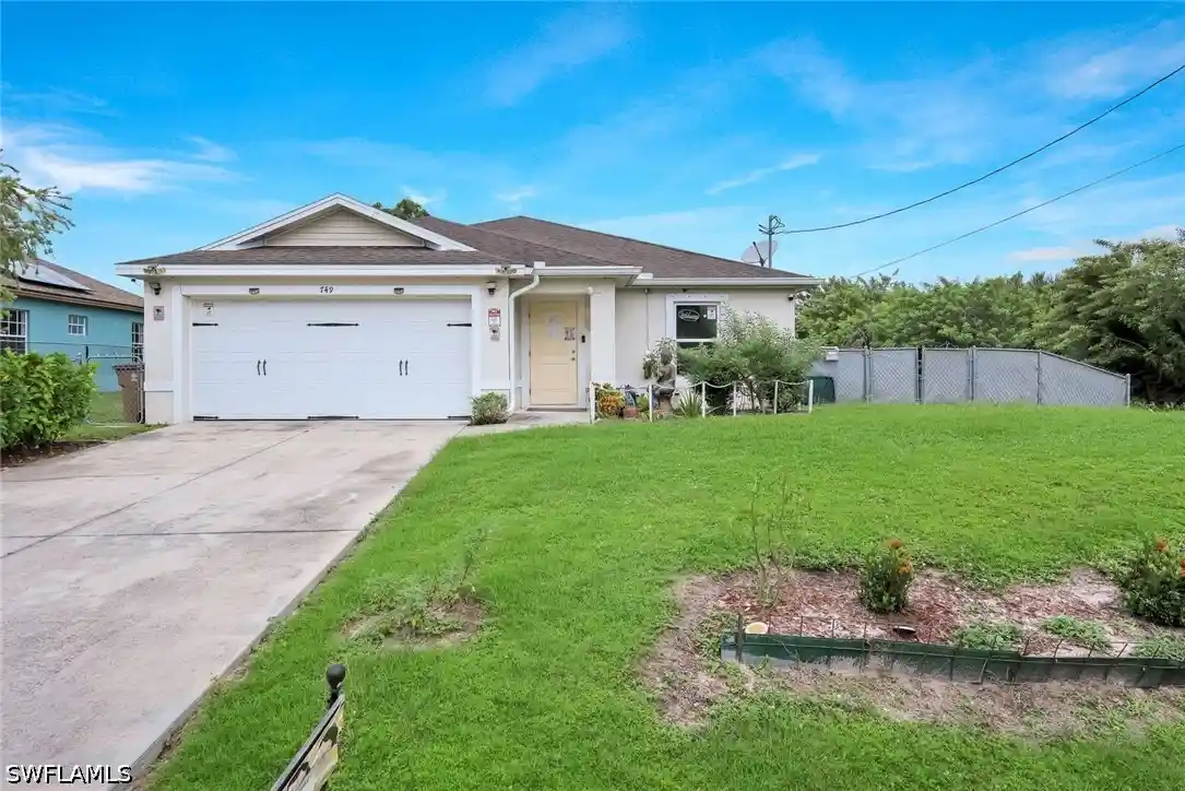 Single family home for sale at 749 Chemstrand St E, Lehigh Acres, FL 33974 | MLS# 226036457