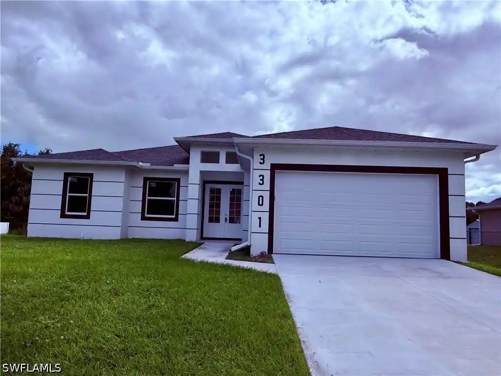 Single family home for sale at 3301 52nd Street W, Lehigh Acres, FL 33971 | MLS# 226036036