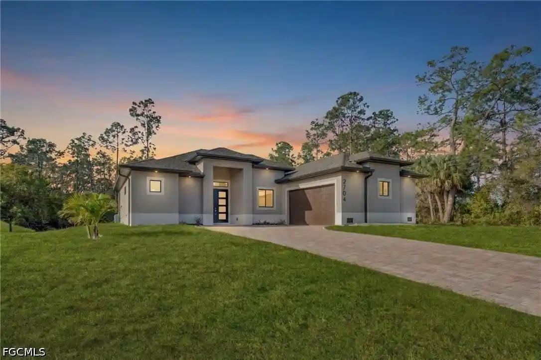 Photo 1 of Single family home for sale at 2704 E 15th Street, Lehigh Acres, FL 33972 | MLS# 2026042874 | Listing updated on 2026-10-26