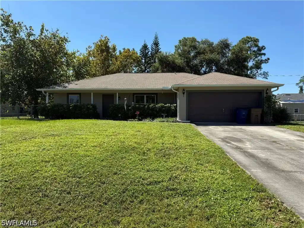 Single family home for sale at 4809 29th Street SW, Lehigh Acres, FL 33973 | MLS# 226036912