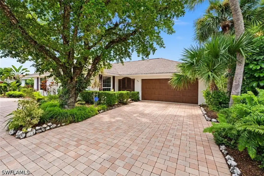 Single family home for sale at 180 Pebble Beach Blvd, Naples, FL 34113 | MLS# 226035243