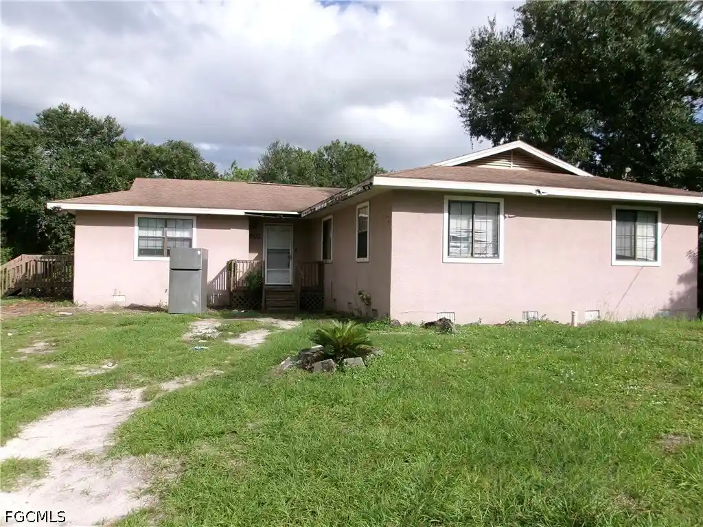 Photo 1 of Single family home for sale at 902 Poinsettia Ave, Lehigh Acres, FL 33972 | MLS# 2026044707 | Listing updated on 2026-10-23