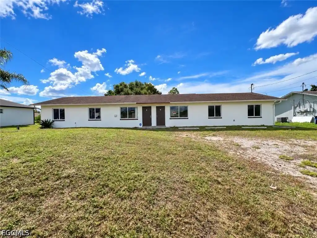 Photo 1 of Multi family home for sale at 712/714 Gilbert Ave S, Lehigh Acres, FL 33973 | MLS# 2026044741 | Listing updated on 2026-10-24