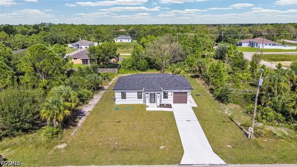 Photo 1 of Single family home for sale at 867 Millpond St E, Lehigh Acres, FL 33974 | MLS# 2026044744 | Listing updated on 2026-10-25