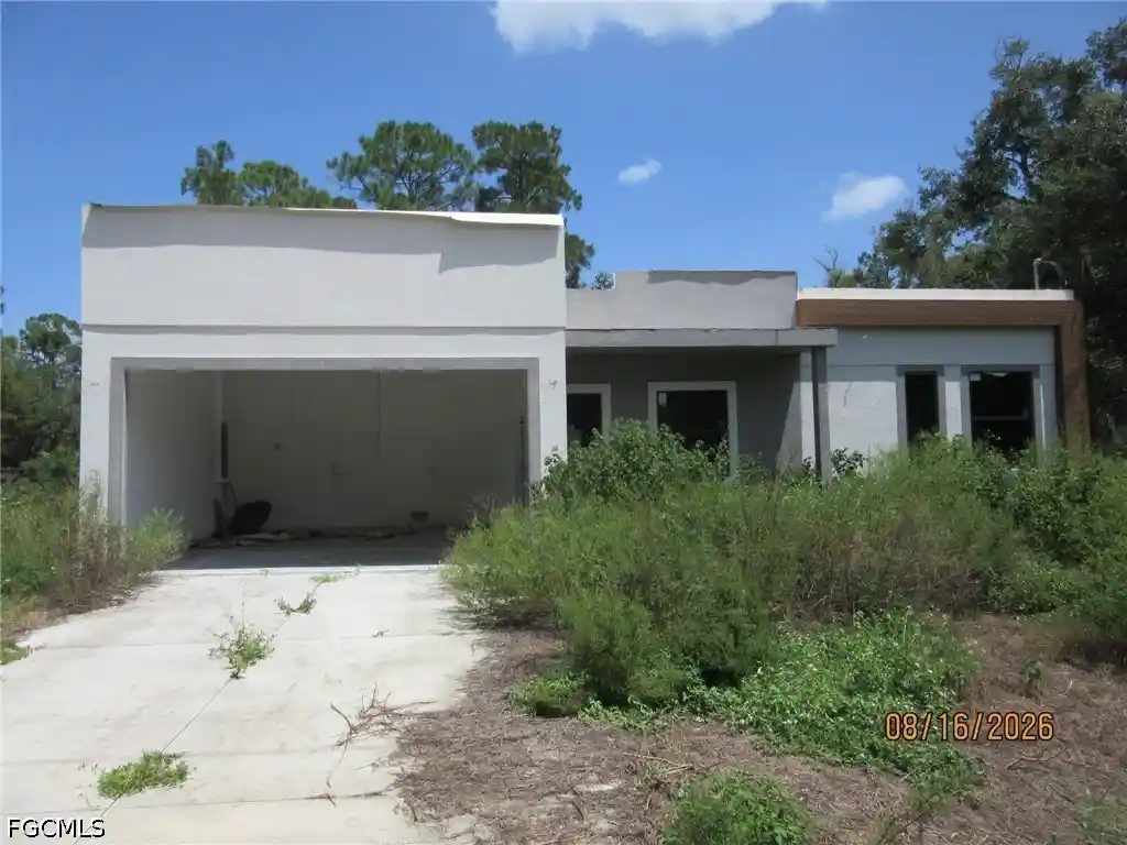 Photo 1 of Single family home for sale at 701 E 17th Street, Lehigh Acres, FL 33972 | MLS# 2026044874 | Listing updated on 2026-10-25