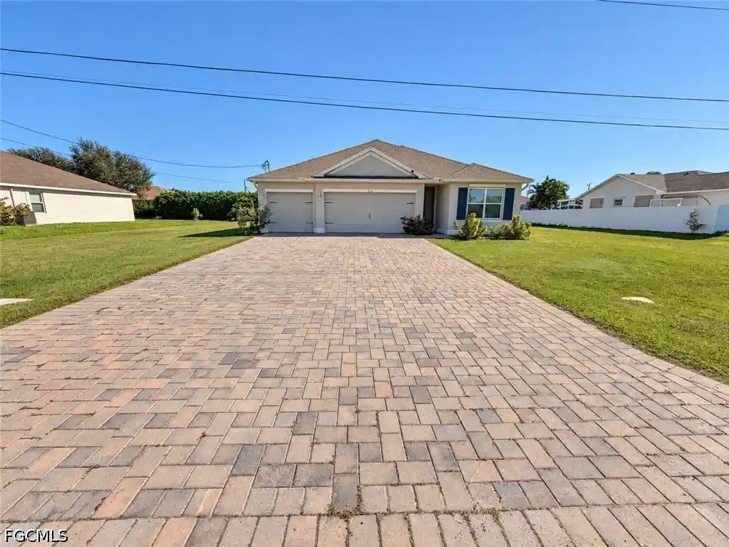 Single family home for sale at 429 NE Juanita Pl, Cape Coral, FL 33909 | MLS# 2026044885