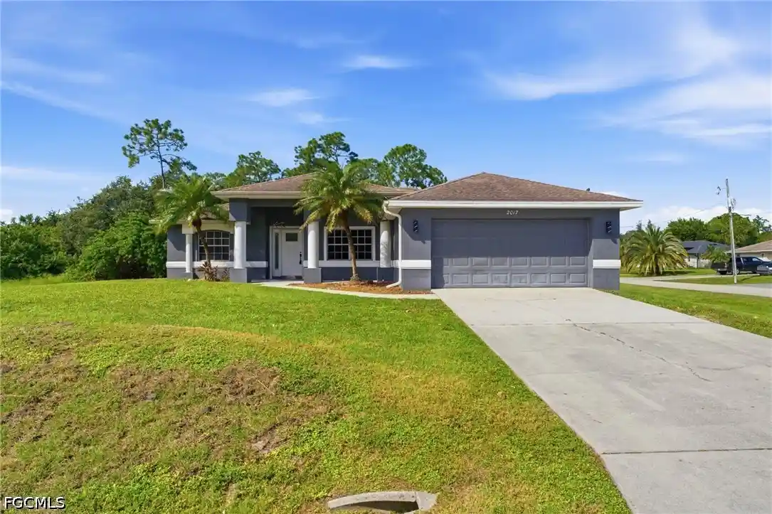Photo 1 of Single family home for sale at 2017 Olsen Ln, Lehigh Acres, FL 33972 | MLS# 2026044912 | Listing updated on 2026-10-26