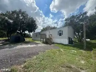 Manufactured home for sale at 210 N Zambria St, Clewiston, FL 33440 | MLS# 2026044954