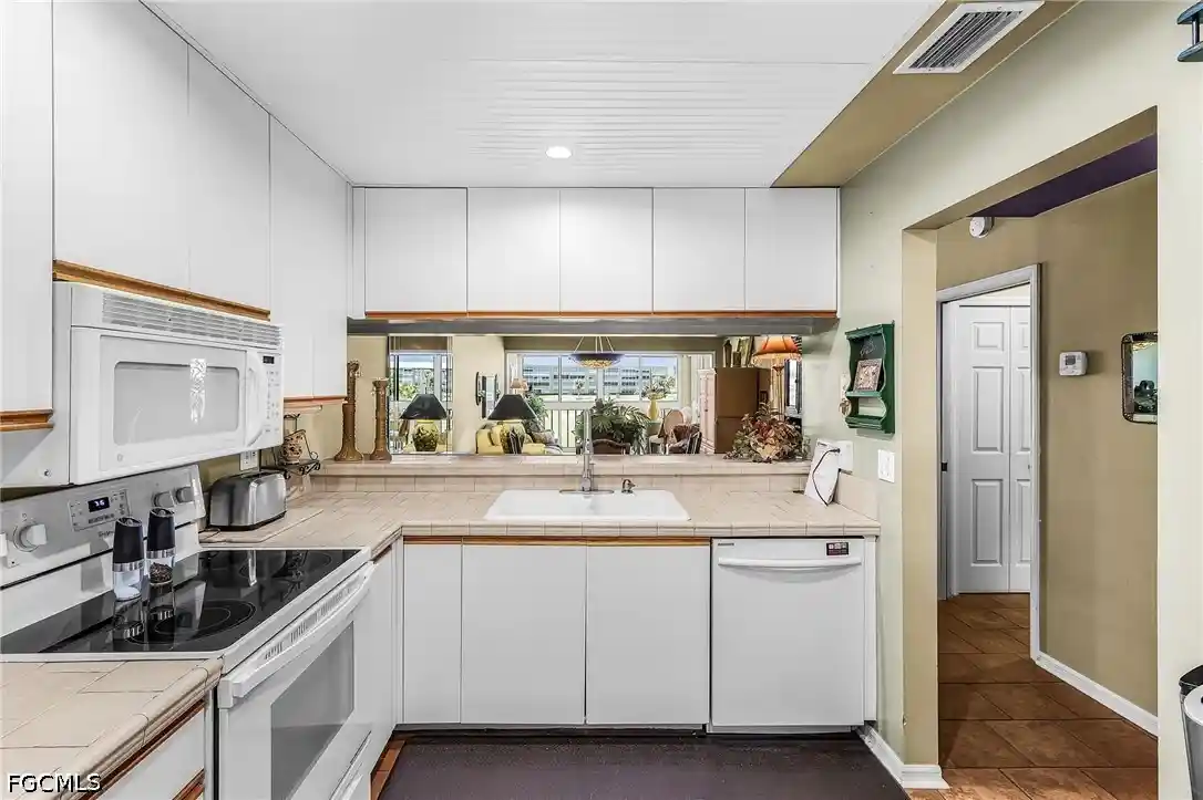 Photo 1 of Condo for sale at 14871 Hole In One Cir, Fort Myers, FL 33919 | MLS# 2026045001 | Listing updated on 2026-10-26