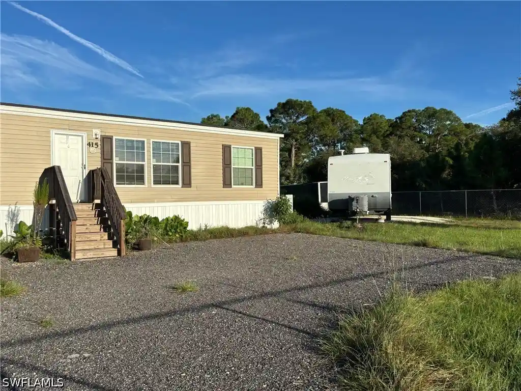 Manufactured home for sale at 415 S Brida St, Montura Ranches, FL 33440 | MLS# 226038927