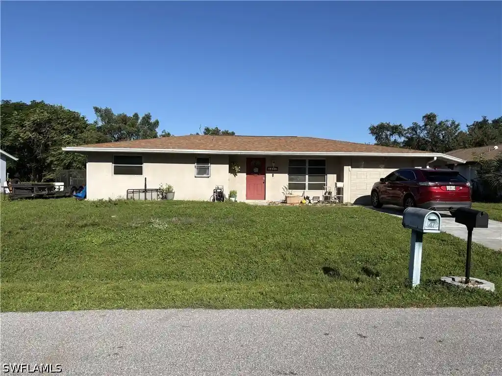 Single family home for sale at 1477 Harmony Dr, Port Charlotte, FL 33952 | MLS# 226039049