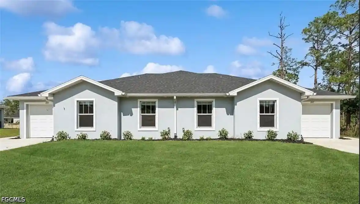 Photo 1 of Multi family home for sale at 1955/1957 Laverna Ave, Lehigh Acres, FL 33972 | MLS# 2026045366 | Listing updated on 2026-10-28