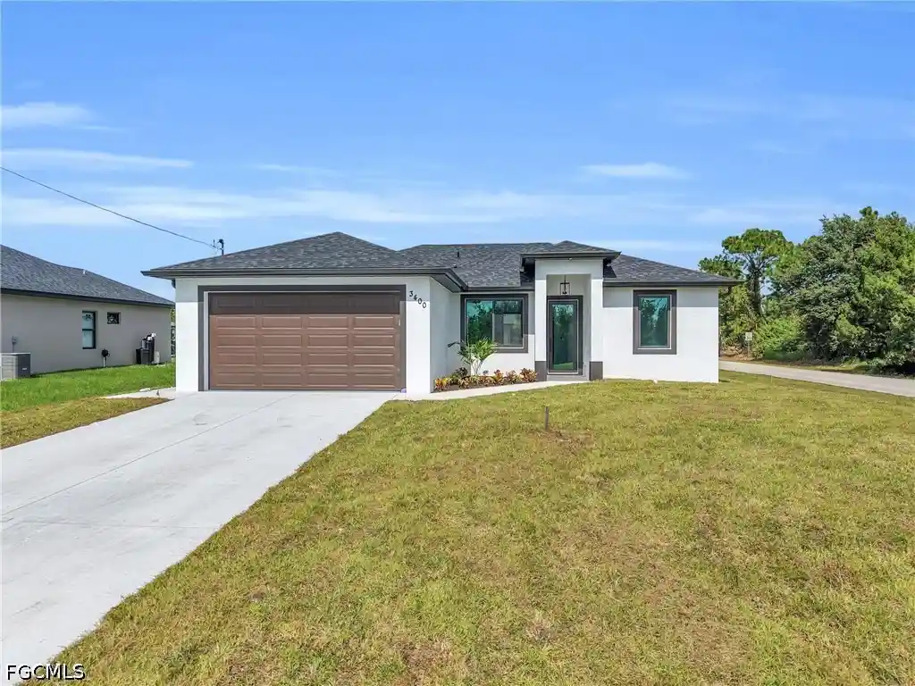 Single family home for sale at 3400 15th Street SW, Lehigh Acres, FL 33976 | MLS# 2026045368
