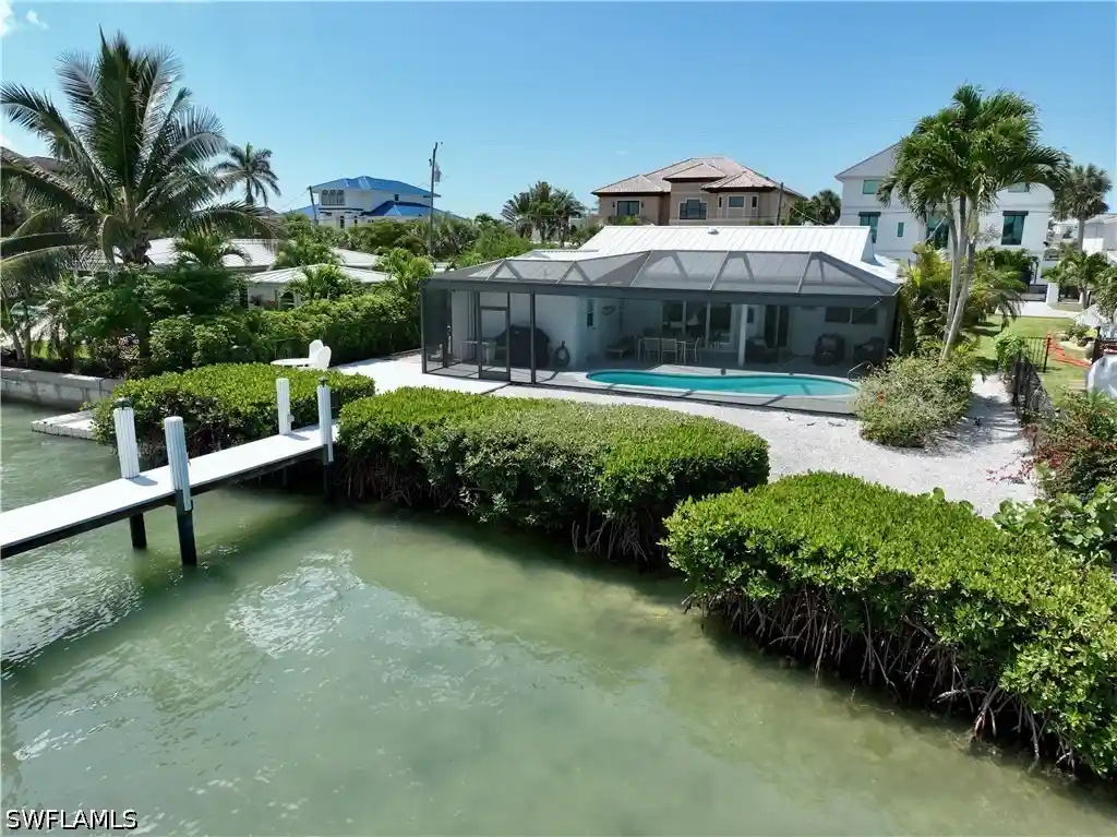 Single family home for sale at 19 Pelican St E, Naples, FL 34113 | MLS# 226039381