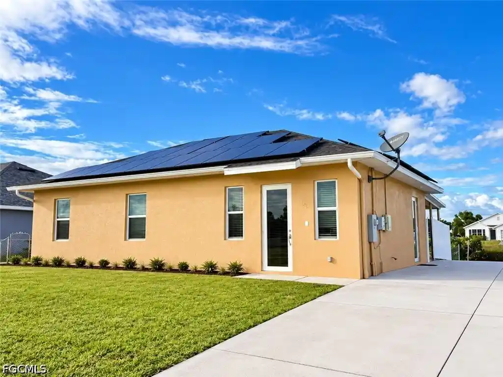 Single family home for sale at 4106 26th Street SW, Lehigh Acres, FL 33976 | MLS# 2026045543
