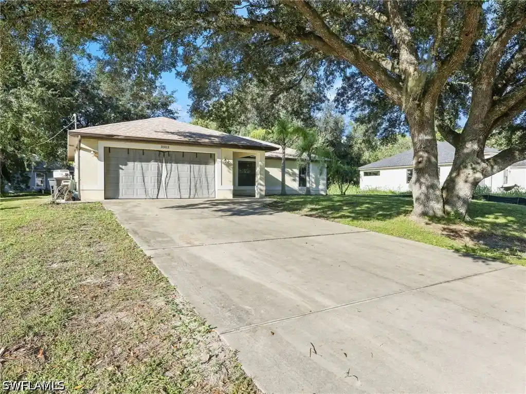 Single family home for sale at 3303 E 8th Street, Lehigh Acres, FL 33972 | MLS# 226039043