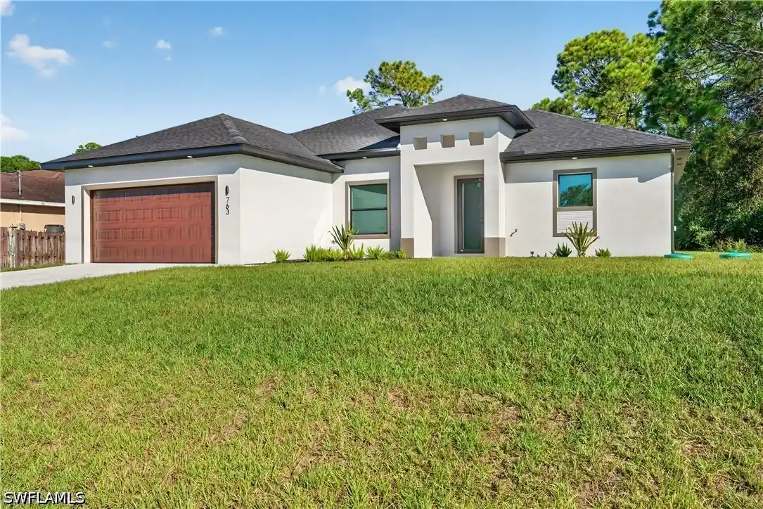Single family home for sale at 763 Clancy St E, Lehigh Acres, FL 33974 | MLS# 226039593