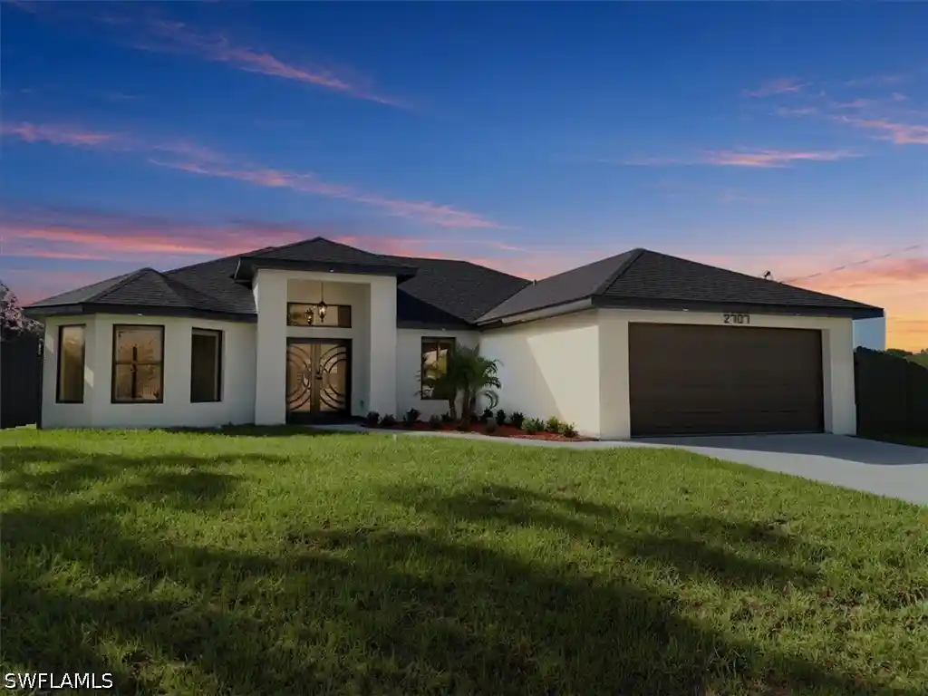 Single family home for sale at 2707 63rd Street W, Lehigh Acres, FL 33971 | MLS# 226039609