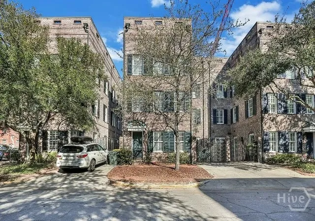 Photo 1 of Townhouse for sale at 404 E Mcdonough St, Savannah, GA 31401 | MLS# SA361305 | Listing updated on 2026-07-27