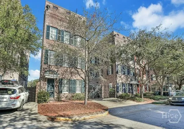 Photo 2 of Townhouse for sale at 404 E Mcdonough St, Savannah, GA 31401 | MLS# SA361305 | Listing updated on 2026-07-27