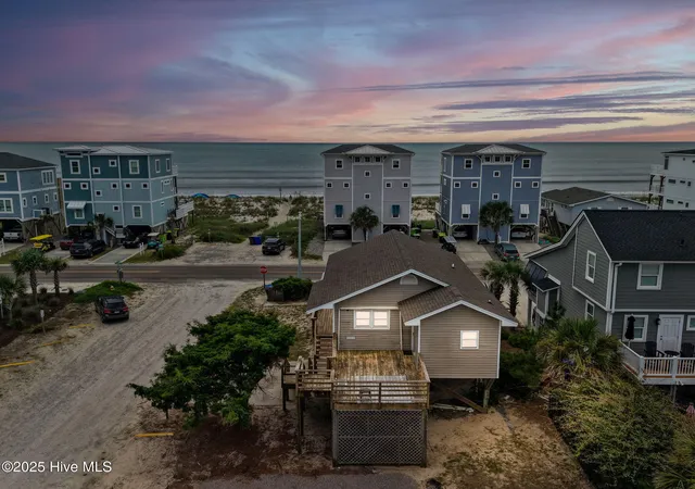 Photo 1 of Single family home for sale at 930 E Beach Dr, Oak Island, NC 28465 | MLS# 100585917 | Listing updated on 2026-08-20