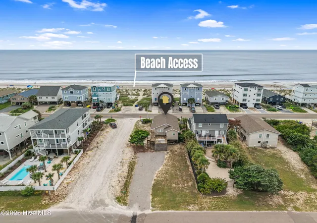 Photo 2 of Single family home for sale at 930 E Beach Dr, Oak Island, NC 28465 | MLS# 100585917 | Listing updated on 2026-08-20