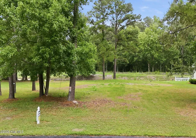 Photo 1 of Land for sale at 106 Cedar Tree Ln Sw, Calabash, NC 28467 | MLS# 100583434 | Listing updated on 2026-08-19