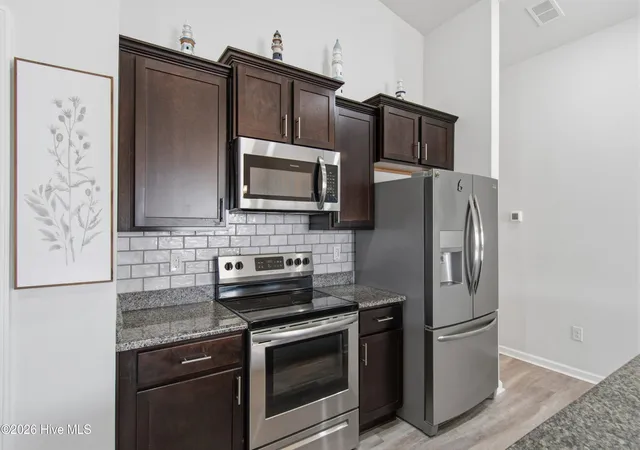 Photo 4 of Townhouse for sale at 1933 Coleman Lake Dr, Carolina Shores, NC 28467 | MLS# 100554412 | Listing updated on 2026-08-19