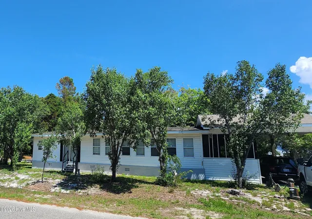 Photo 1 of Manufactured home for sale at 202 Ne 66th St, Oak Island, NC 28465 | MLS# 100599858 | Listing updated on 2026-08-29