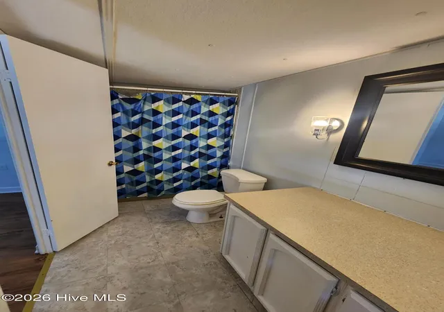 Photo 25 of Manufactured home for sale at 202 Ne 66th St, Oak Island, NC 28465 | MLS# 100599858 | Listing updated on 2026-08-29