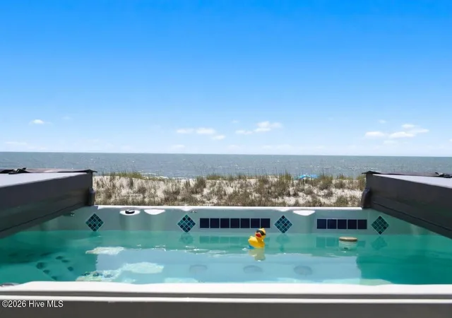 Photo 3 of Single family home for sale at 4327 E Beach Dr, Oak Island, NC 28465 | MLS# 100576388 | Listing updated on 2026-08-18