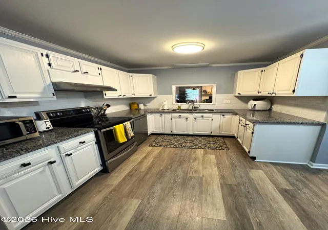 Photo 3 of Townhouse for sale at 2 Palmetto Pl, Greenville, NC 27858 | MLS# 100591308 | Listing updated on 2026-09-10