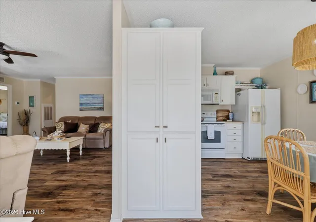 Photo 3 of Manufactured home for sale at 703 Dogwood Dr, Sunset Beach, NC 28468 | MLS# 100588143 | Listing updated on 2026-09-16