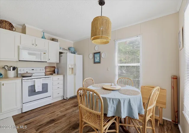 Photo 4 of Manufactured home for sale at 703 Dogwood Dr, Sunset Beach, NC 28468 | MLS# 100588143 | Listing updated on 2026-09-16