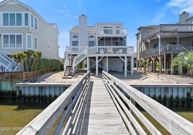 Photo 1 of Single family home for sale at 1405 Canal Dr, Sunset Beach, NC 28468 | MLS# 100440920 | Listing updated on 2026-05-12