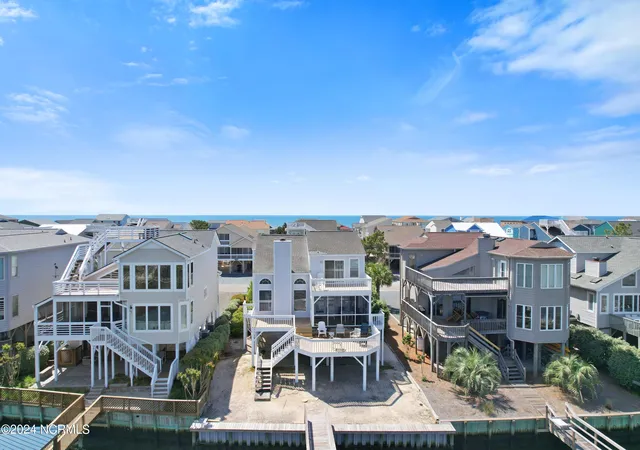 Photo 3 of Single family home for sale at 1405 Canal Dr, Sunset Beach, NC 28468 | MLS# 100440920 | Listing updated on 2026-05-12