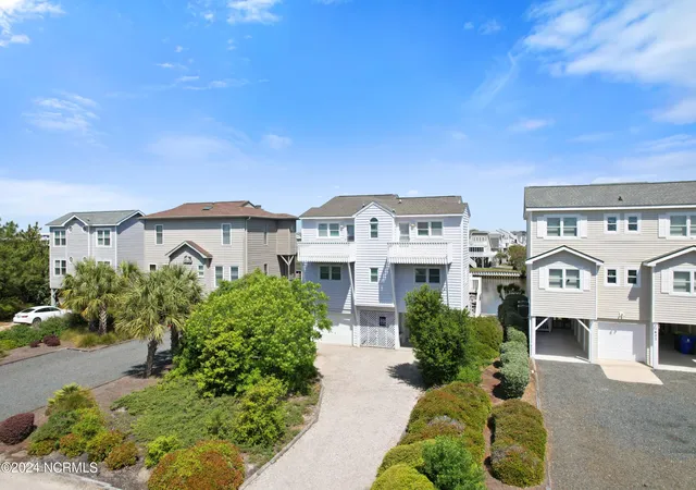 Photo 3 of Single family home for sale at 1405 Canal Dr, Sunset Beach, NC 28468 | MLS# 100440920 | Listing updated on 2026-05-12