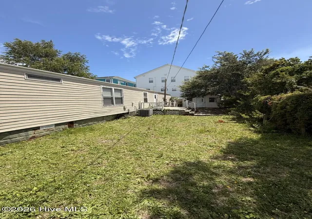 Photo 3 of Manufactured home for sale at 1511 Mackerel Ln, Carolina Beach, NC 28428 | MLS# 100594112 | Listing updated on 2026-08-18