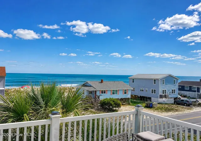 Photo 2 of Single family home for sale at 308 E Beach Dr, Oak Island, NC 28465 | MLS# 100578917 | Listing updated on 2026-08-28