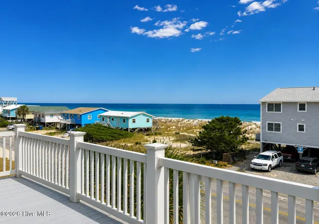 Photo 3 of Single family home for sale at 308 E Beach Dr, Oak Island, NC 28465 | MLS# 100578917 | Listing updated on 2026-08-28