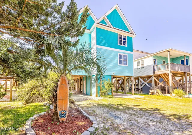 Photo 4 of Single family home for sale at 308 E Beach Dr, Oak Island, NC 28465 | MLS# 100578917 | Listing updated on 2026-08-28