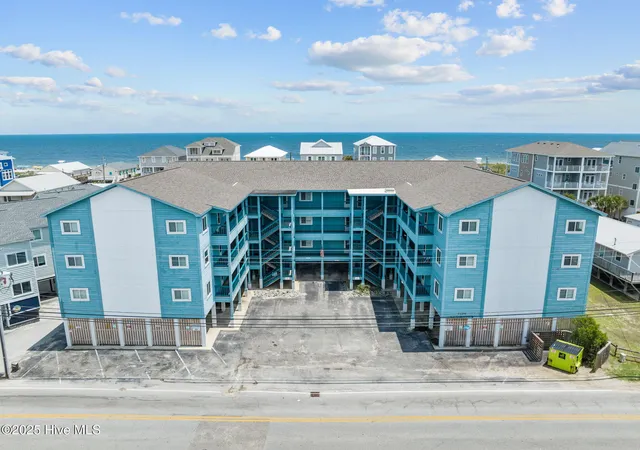 Photo 1 of Condo for sale at 1404 Canal Dr #34, Carolina Beach, NC 28428 | MLS# 100592240 | Listing updated on 2026-08-18