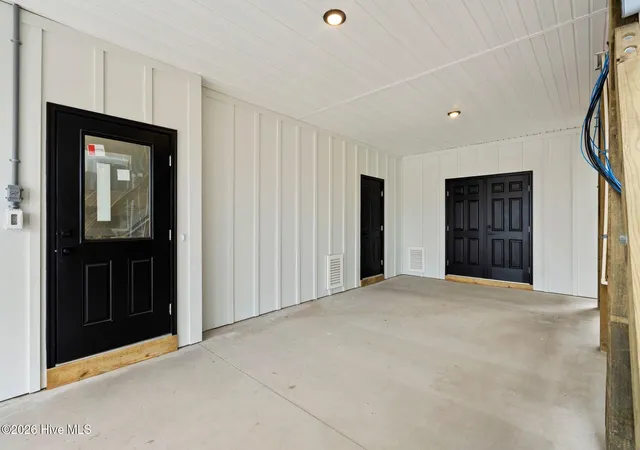 Photo 3 of Townhouse for sale at 721 N New River Dr #A, Surf City, NC 28445 | MLS# 100574185 | Listing updated on 2026-09-17