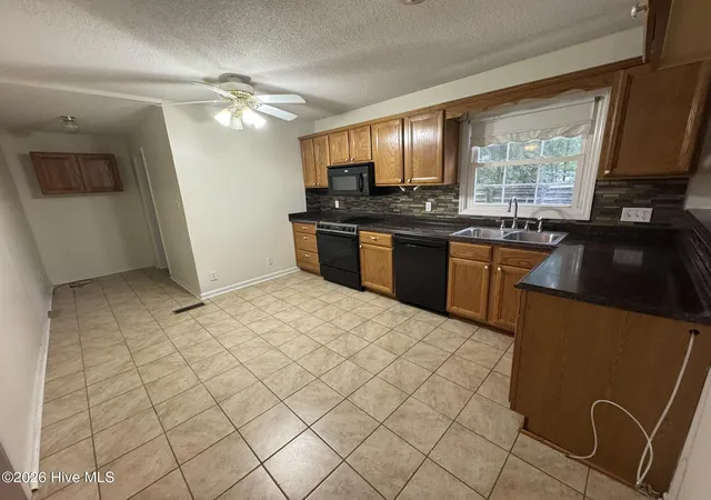 Photo 4 of Single family home for sale at 104 Still Forest Pl, Jacksonville, NC 28540 | MLS# 100599899 | Listing updated on 2026-09-10