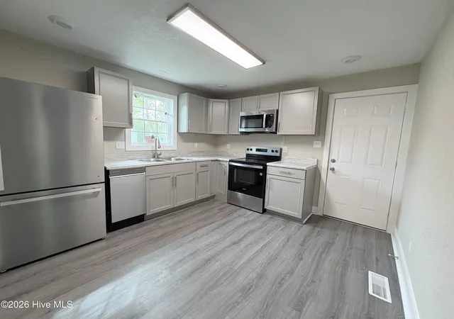 Photo 3 of Single family home for sale at 1111 Wood St, Elizabeth City, NC 27909 | MLS# 100599875 | Listing updated on 2026-09-18