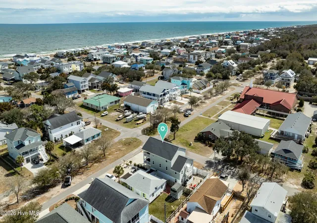 Photo 3 of Single family home for sale at 142 S 6th Avenue, Kure Beach, NC 28449 | MLS# 100596446 | Listing updated on 2026-10-02