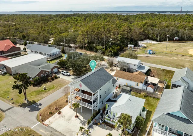 Photo 3 of Single family home for sale at 142 S 6th Avenue, Kure Beach, NC 28449 | MLS# 100596446 | Listing updated on 2026-10-02