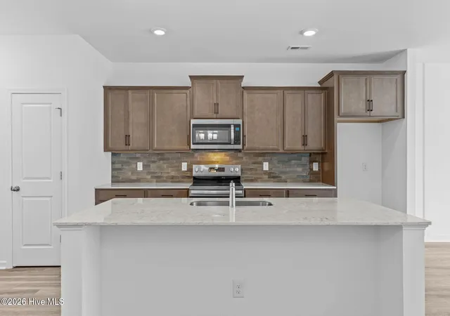 Photo 3 of Townhouse for sale at 7145 Fisk Dr NE #Lot 52, Leland, NC 28451 | MLS# 100588515 | Listing updated on 2026-09-20